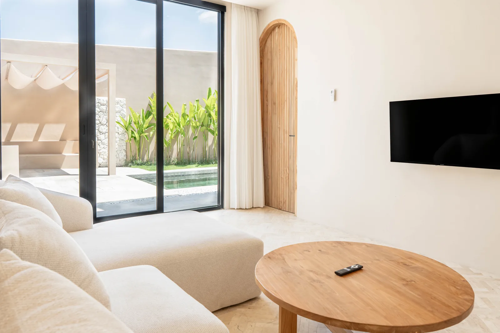 Living room opening to the pool